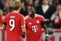 Pemain Bayern Munchen Alphonso Davies (kanan) merayakan gol bersama Harry Kane dalam laga Liga Champions antara Bayern vs Bodo/Glimt di Munich, Jerman, 10 September 2026 (c) AP Photo/Lennart Preiss