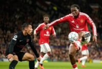 Patrick Dorgu menikmati debut Liga Champions bersama Manchester United setelah membantu Setan Merah menang 4-0. (AP Photo/Dave Thompson)